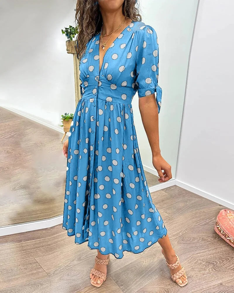 RetroSchick | Feminines Midikleid mit Polka-Dots & Knopfleiste