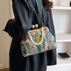 FloraPerle | Vintage Handtasche mit Perlengriff & Blumenmuster