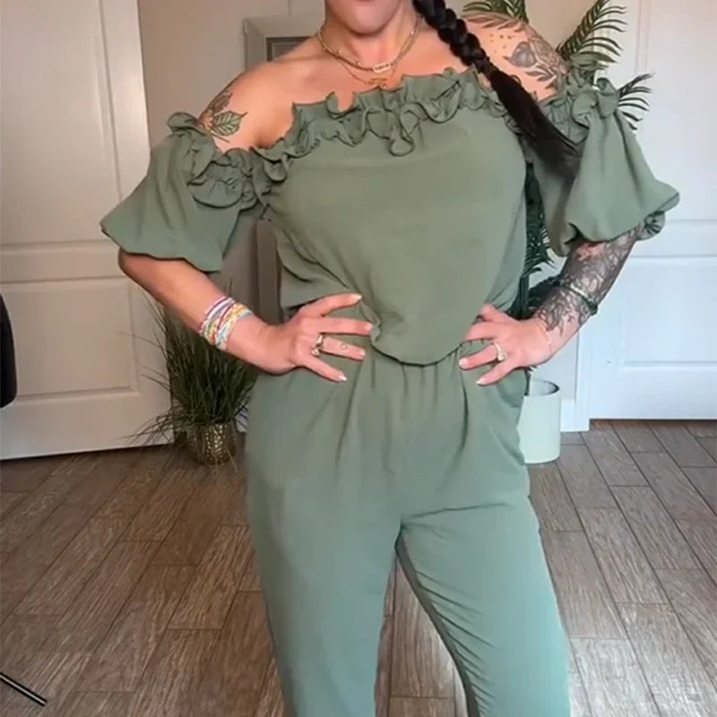ReinEleganz | Schulterfreier Jumpsuit mit Rüschen