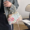 FloraPerle | Vintage Handtasche mit Perlengriff & Blumenmuster