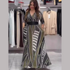 Stilreich | Maxikleid mit abstraktem Muster und Taillengürtel