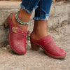 SchrittGlanz | Leder-Clogs mit Blumenprägung & Absatz