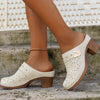 SchrittGlanz | Leder-Clogs mit Blumenprägung & Absatz